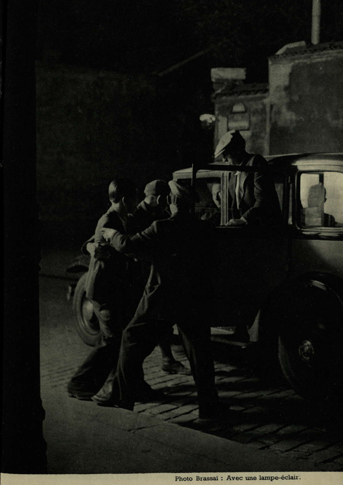 An example of Brassaï’s mastery of flash photography in the dark streets of Paris, from Éclairages artificiels (St Andrews copy Photo TR590.N38)