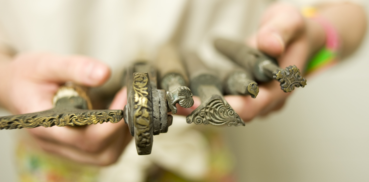 A selection of metal tools used in blind-stamp and gilt decoration of book bindings, leftover from the bindery of the University