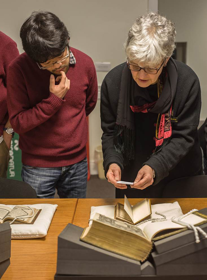 St Andrews academics viewing The Temple and other highlights of Special Collections’ holdings in early 17th century English literature.