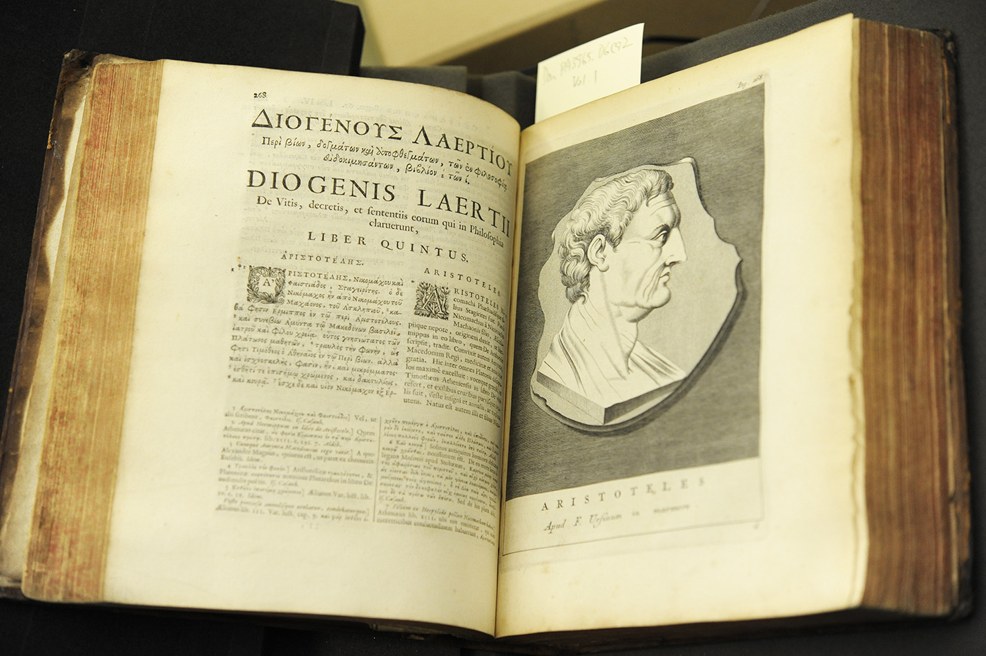 A Beardless Aristotle. Notice the decorated initials in both the Ancient Greek and Latin texts in the page on the left. (Don PA3965.D6C92).