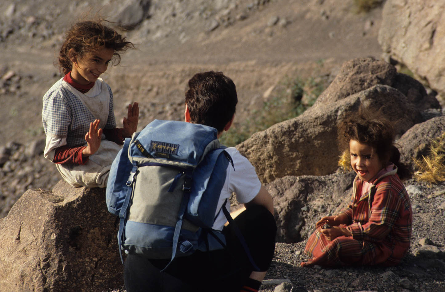 Getting to know you - Playing cats cradle with the local girls on the Tichka Plateau (HMB-1646)