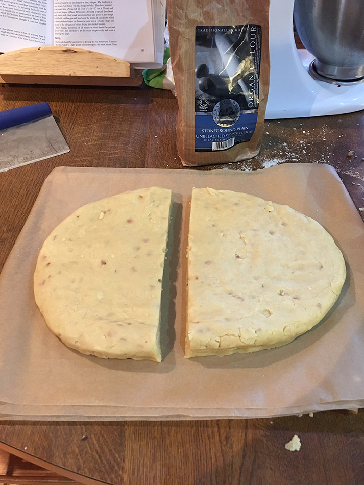 Somewhat in the manner of a Saxon arch