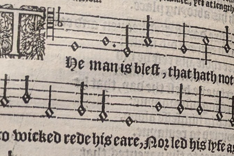 Close-up of musical notation of one of the psalms in the book